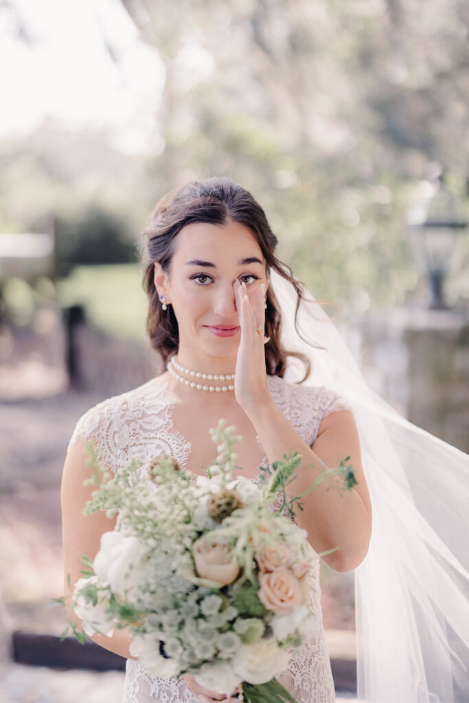 Wedding First Look - Bride prepares to see groom at first look.