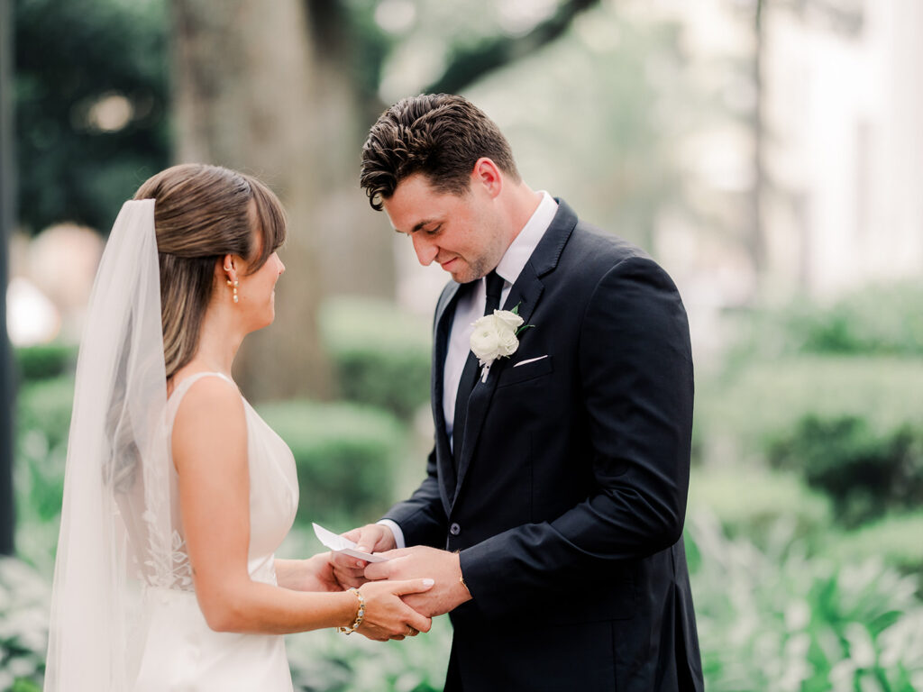 Wedding First Look - Bride and groom share personal vows during first look.