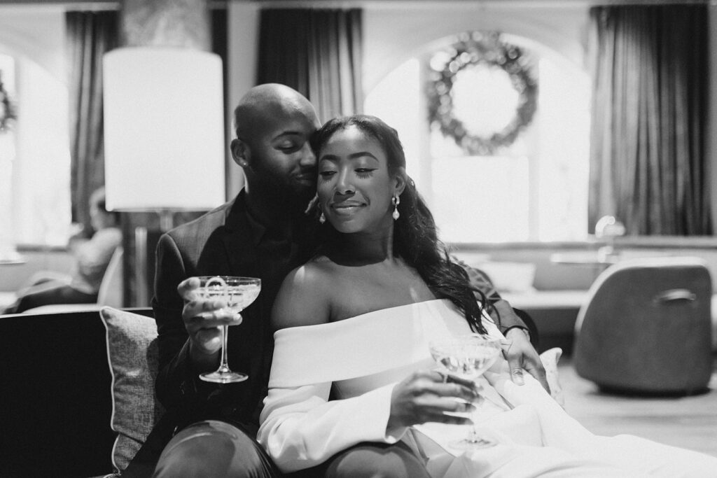 Savannah engagement session with couple enjoying drinks.