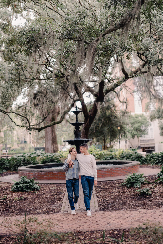 Couple photos after proposal in Lafayette Square, Savannah.