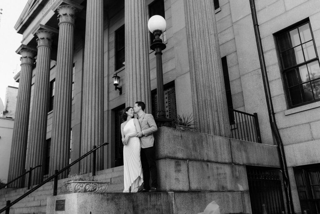Bride and groom in formal engagement photo outfits in Savannah.