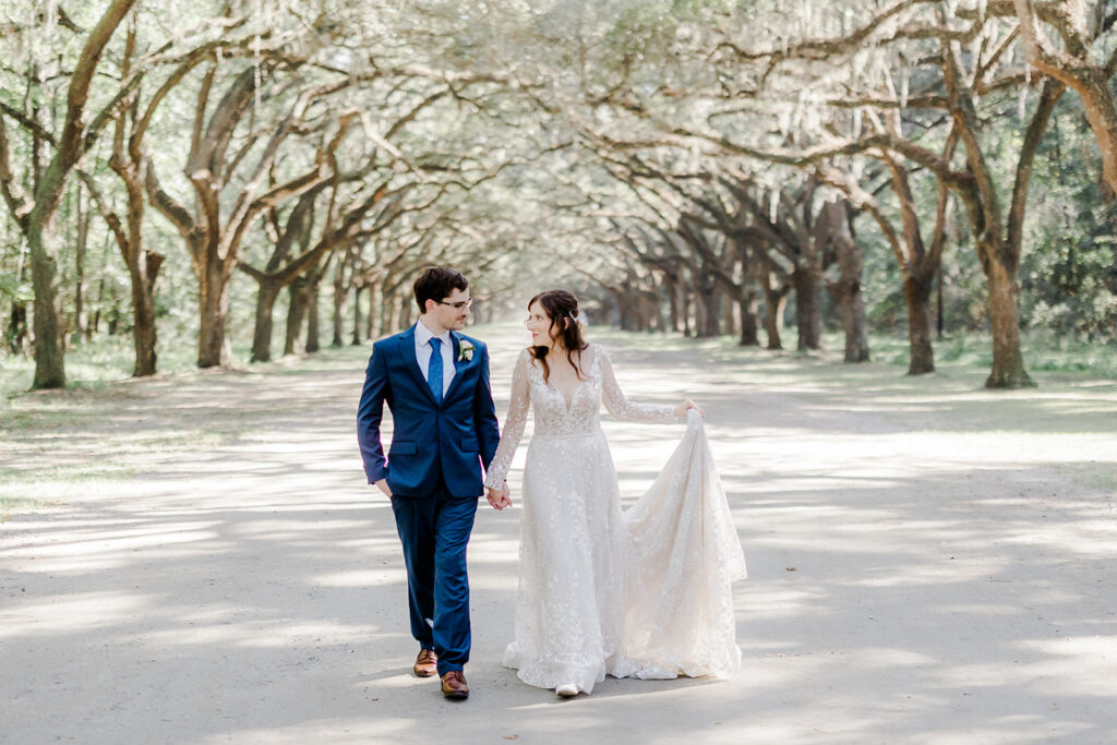 Fall wedding inspiration with bride wearing long-sleeved lace gown.