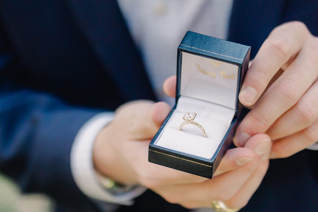 Engagement ring in box.