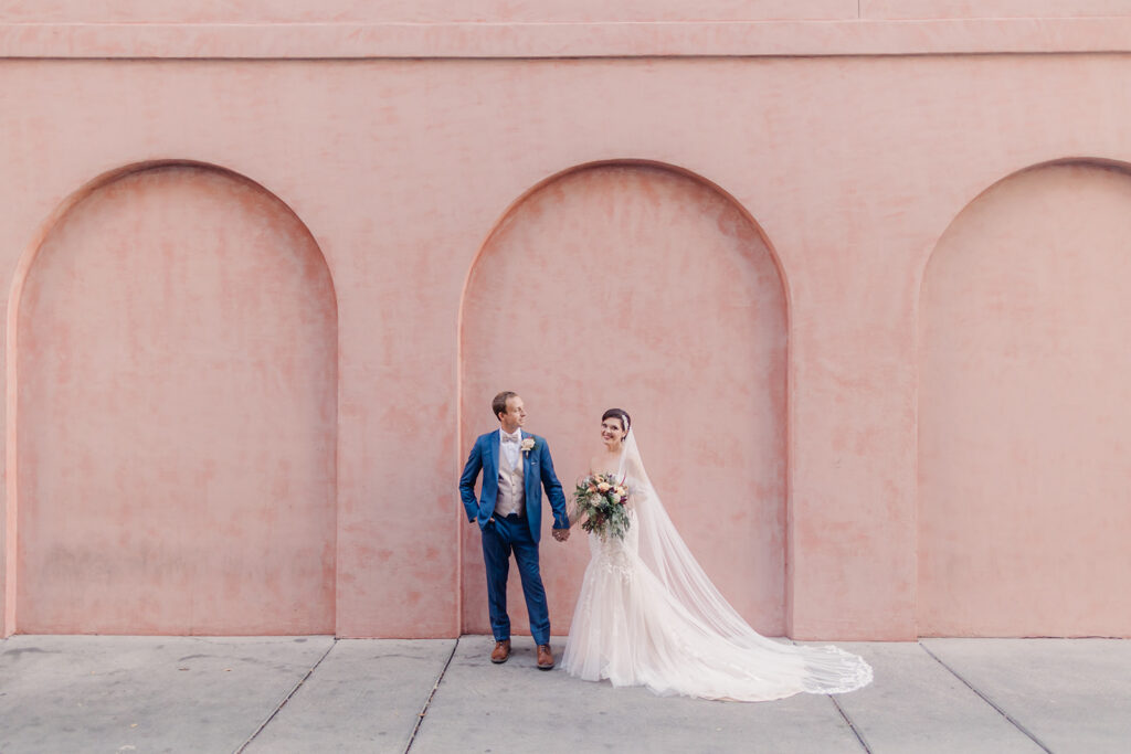 Bride and groom portraits outside Olde Pink House in Savannah.