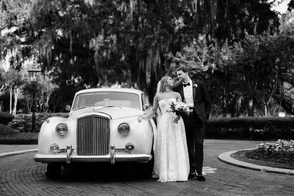 Wedding First Look - Bride and groom portraits with vintage car during first look.