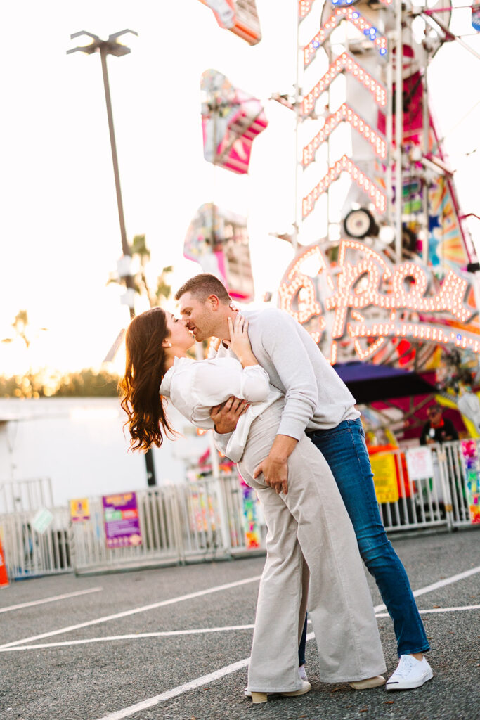 Bride and groom in neutral colored engagement photo outfits at fair in Savannah.