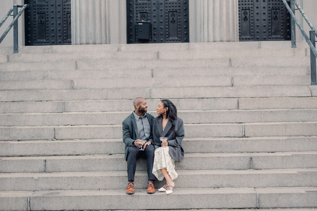 Bride and groom in neutral colored engagement photo outfits in Savannah.