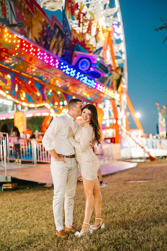 Bride and groom in neutral colored engagement photo outfits at fair in Savannah.