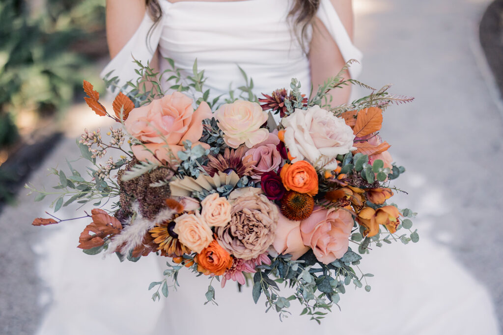 Stunning fall wedding bouquet filled with seasonal colors.