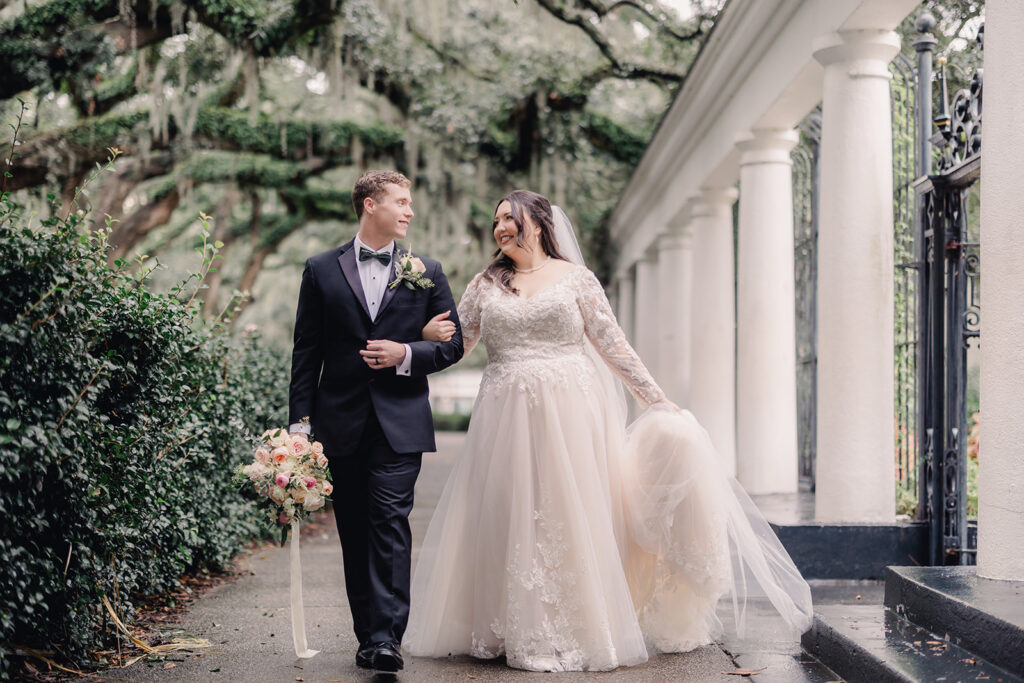 Bride in long-sleeve gown perfect for a fall wedding.