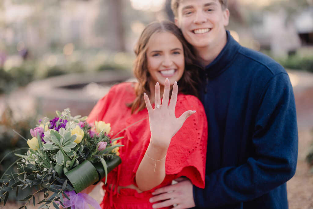 Showing off engagement ring after a surprise proposal. 