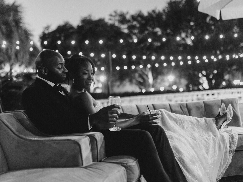 Wedding First Look - Bride and groom pose for romantic photo at sunset. 