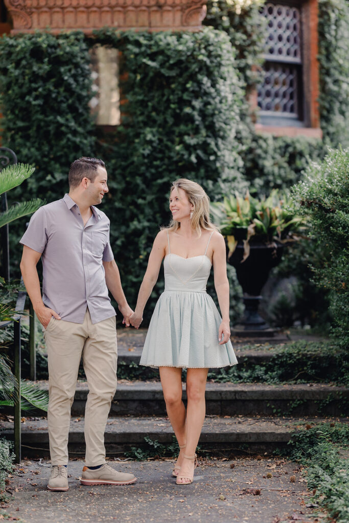 Bride and groom in neutral colored engagement photo outfits in Savannah.