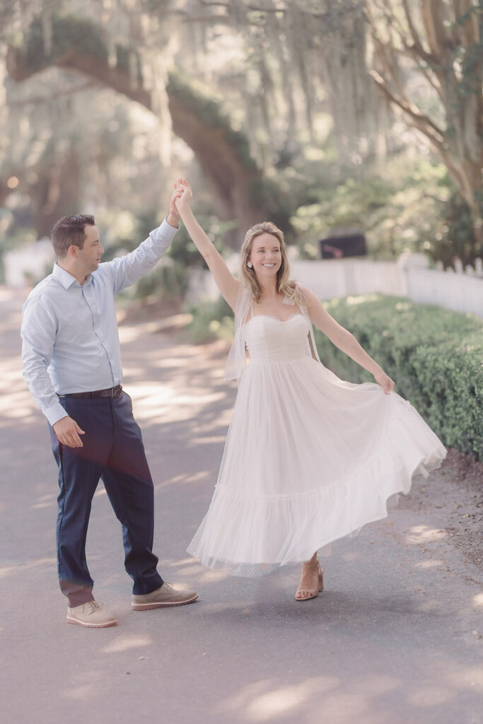 Bride and groom in neutral colored engagement photo outfits in Savannah.