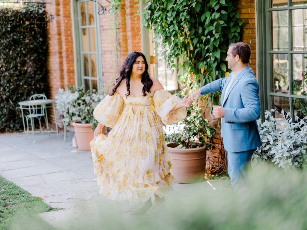 Bride and groom in pastel colored engagement photo outfits in San Francisco.