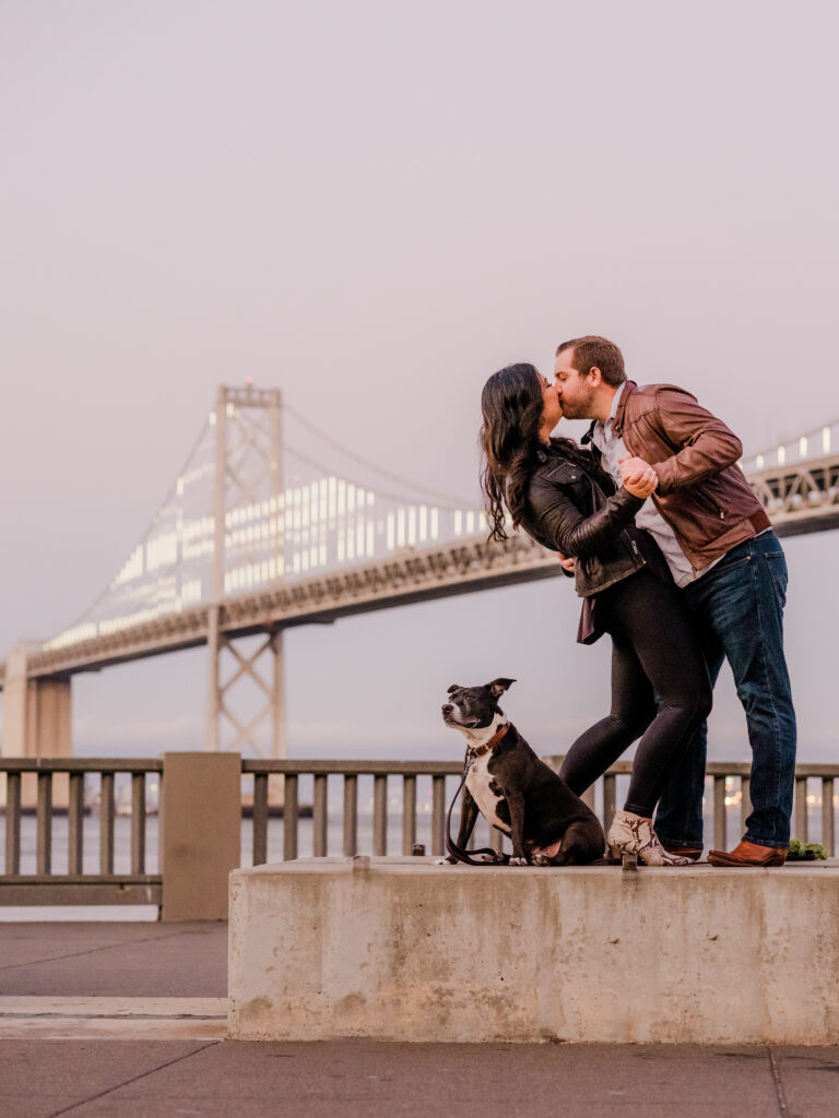 Bride and groom in structured style clothing for engagement photo in San Francisco.