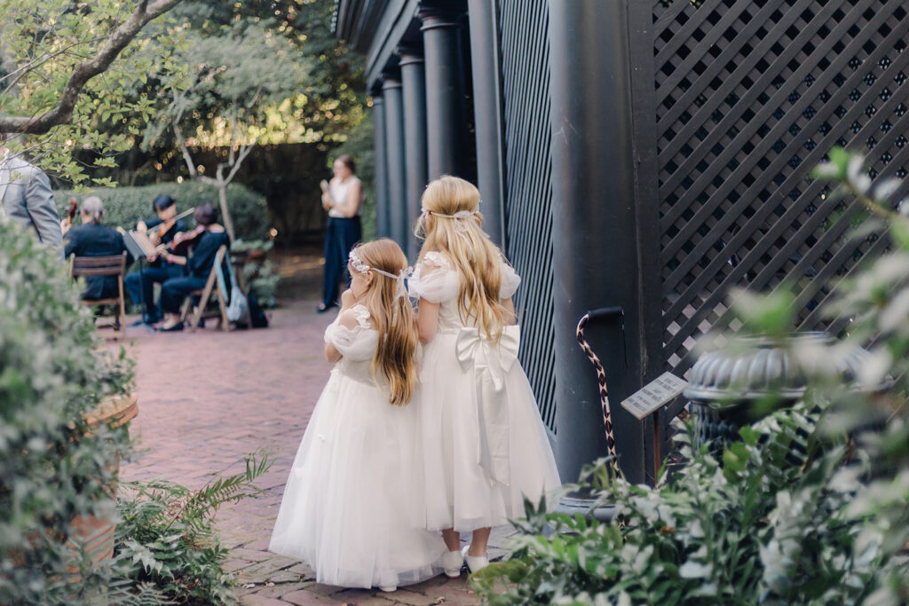 Flower Girls Waiting to Walk Down the Aisle at Ships of the Sea Maritime Museum in Savannah - Esther Griffin Photography